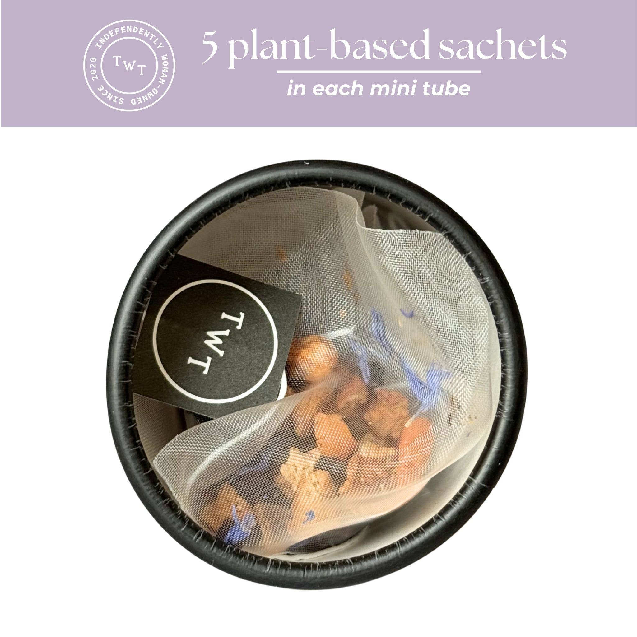 Black container with plant-based sachets and TWT logo on a white background