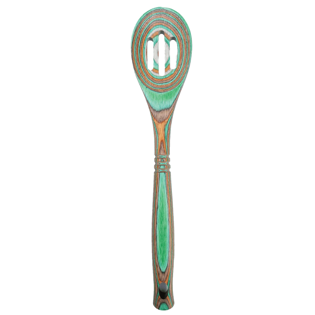 Decorative wooden spoon with a green handle on a white background