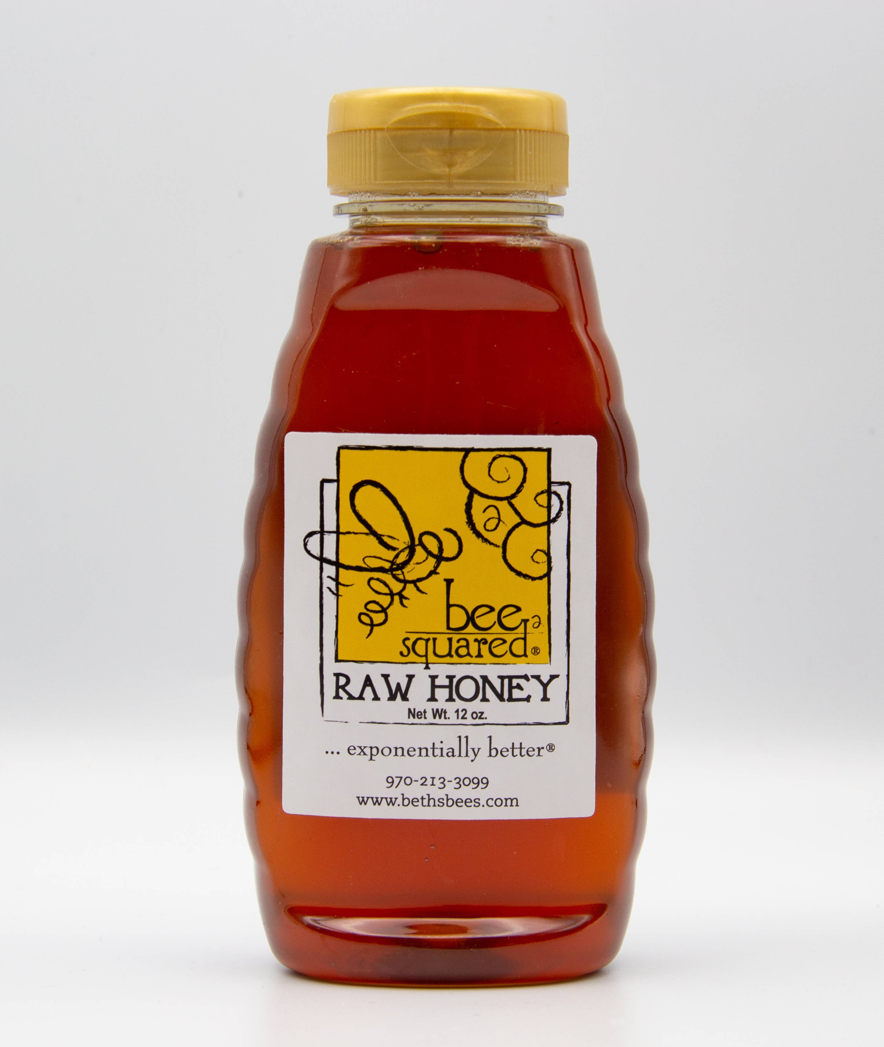 Bottle of St. Bee Squared raw honey on a white background