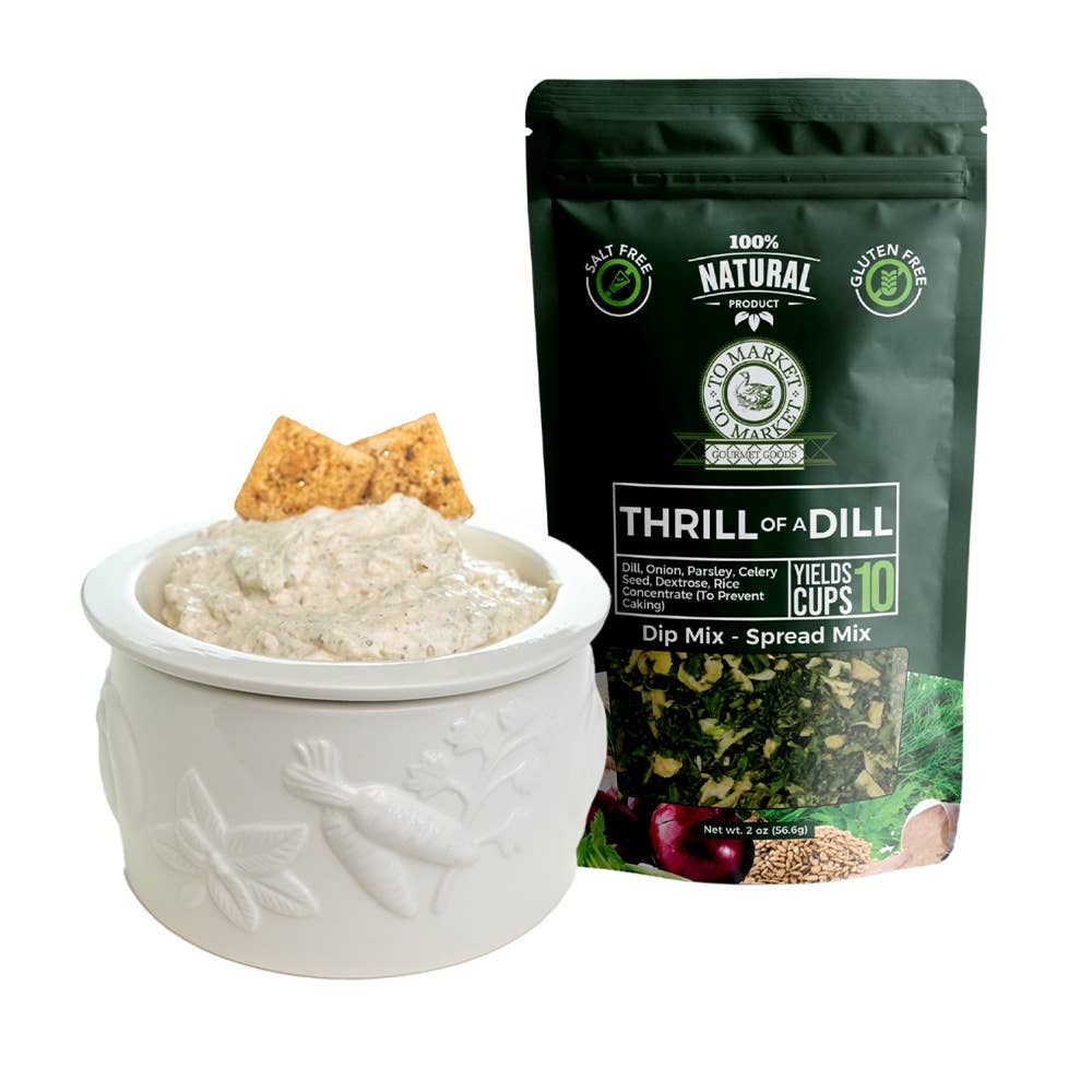 Dip mix in a bowl with a package of &