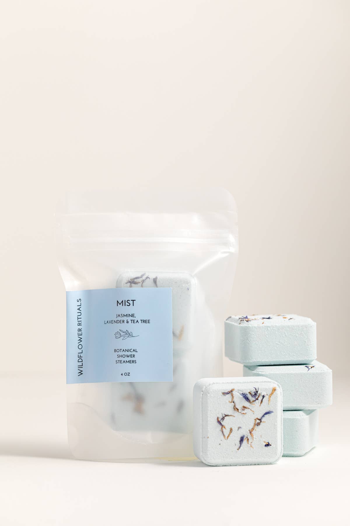 Marble-textured soap packaging with a blue label on a light beige background