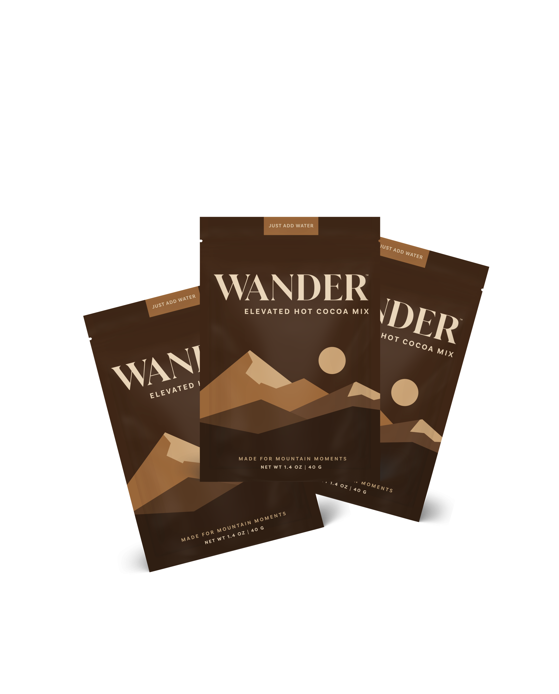 Three packages of Wander Elevated Hot Cocoa Mix on a white background