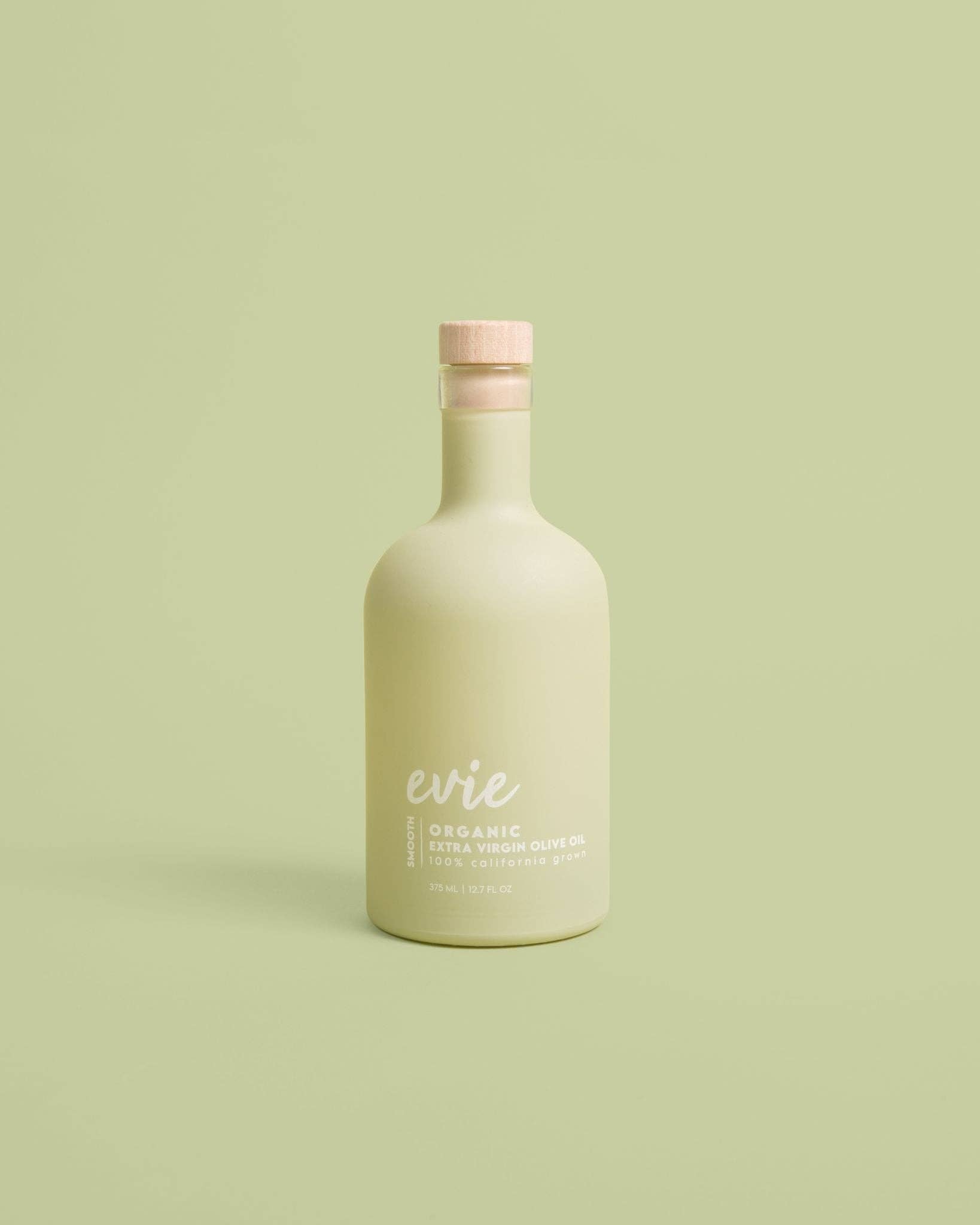 Beige bottle with &