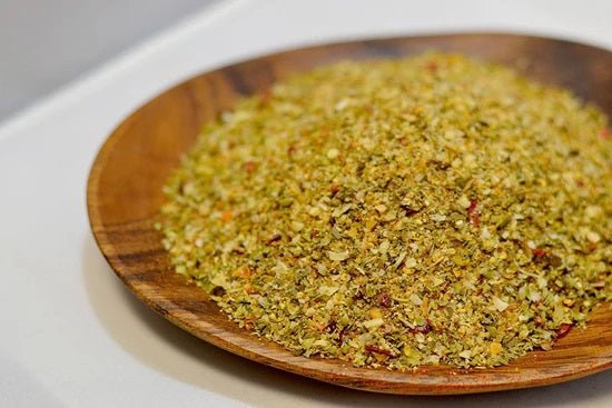the spice guy Colorado chicken & veg spice blend on wooden plate