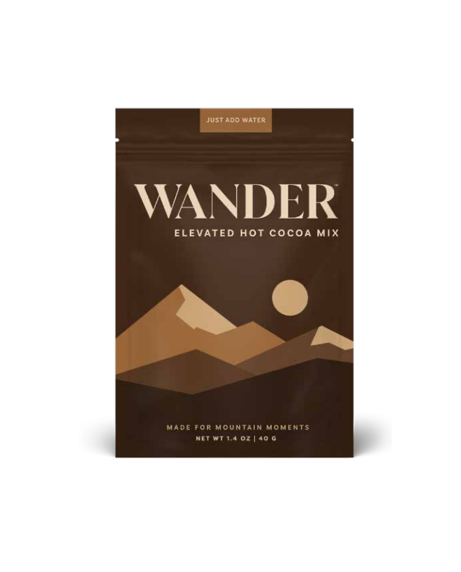 Wander elevated hot cocoa mix package with mountain design on a white background