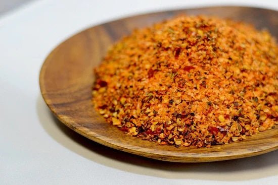 steak & veg spice blend on wooden plate