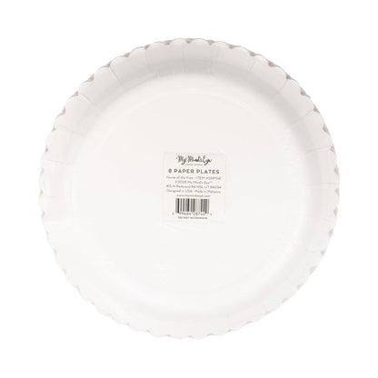 White paper plate with a label on a white background