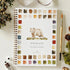 Woodland watercolor workbook with a bear illustration on a white surface with decorative elements.