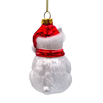Christmas ornament of a polar bear with a red hat on a white background