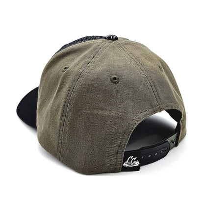 Back view of a green cap with black brim on a white background