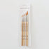 Set of paintbrushes in packaging on a white background