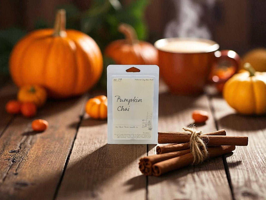 Pumpkin Chai product packaging with pumpkins and cinnamon sticks on a wooden surface