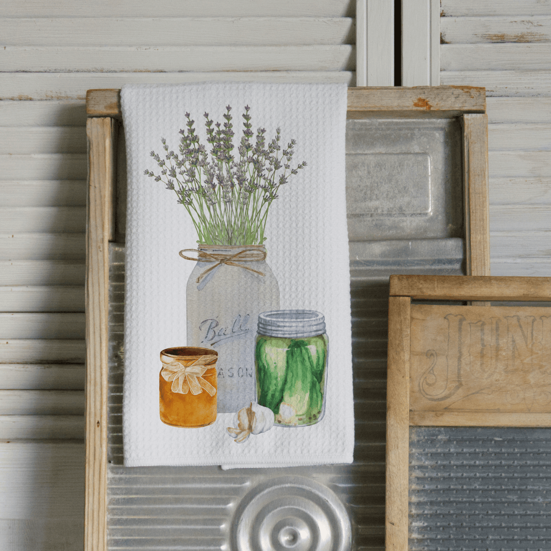 Kitchen towel with a design of jars and lavender on a rustic background