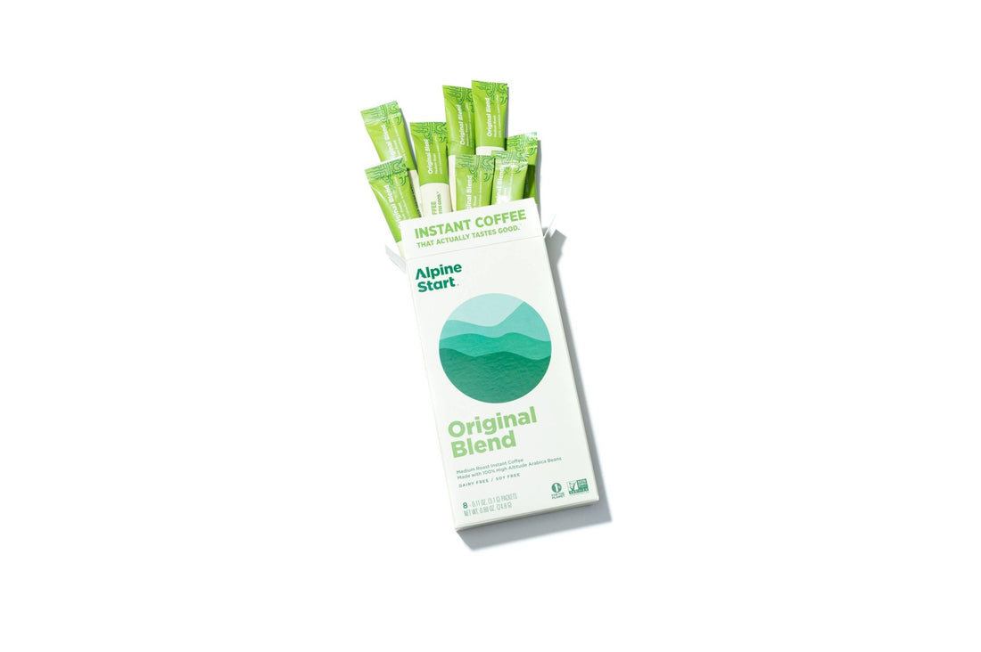 Pack of Alpine Start instant coffee sticks on a white background