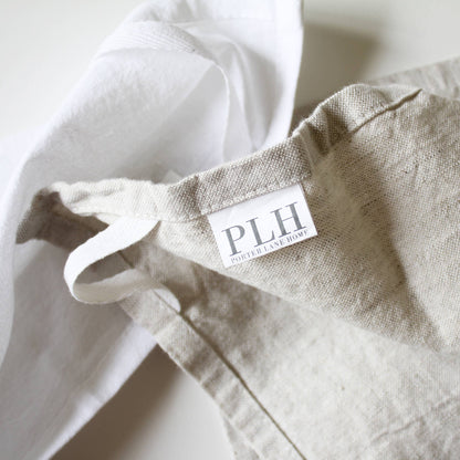 Close-up of a beige fabric with a &