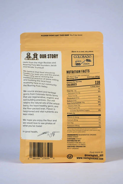 The back of a bag of Flour of the Gods Colorado Organic Whole Wheat Flour, showing the &