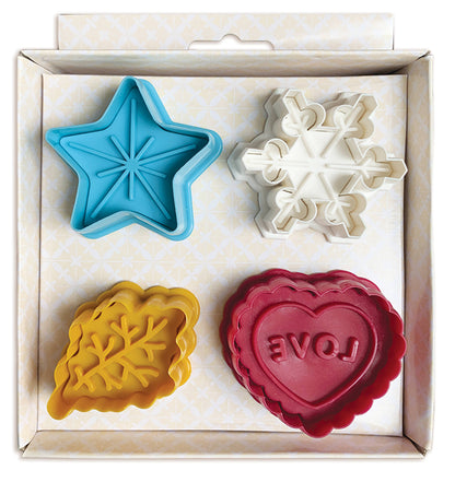 Set of four colorful cookie cutters in a box