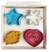 Set of four colorful cookie cutters in a box