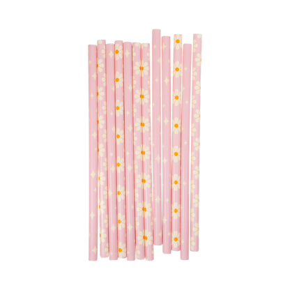 Pink straws with yellow floral patterns on a white background