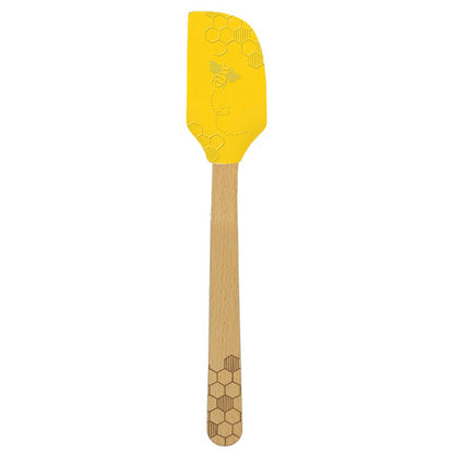 Yellow spatula with wooden handle on a white background