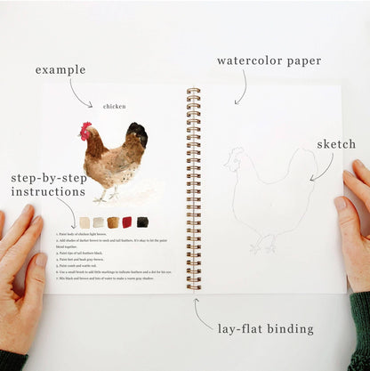 Open notebook with a chicken illustration, labeled &