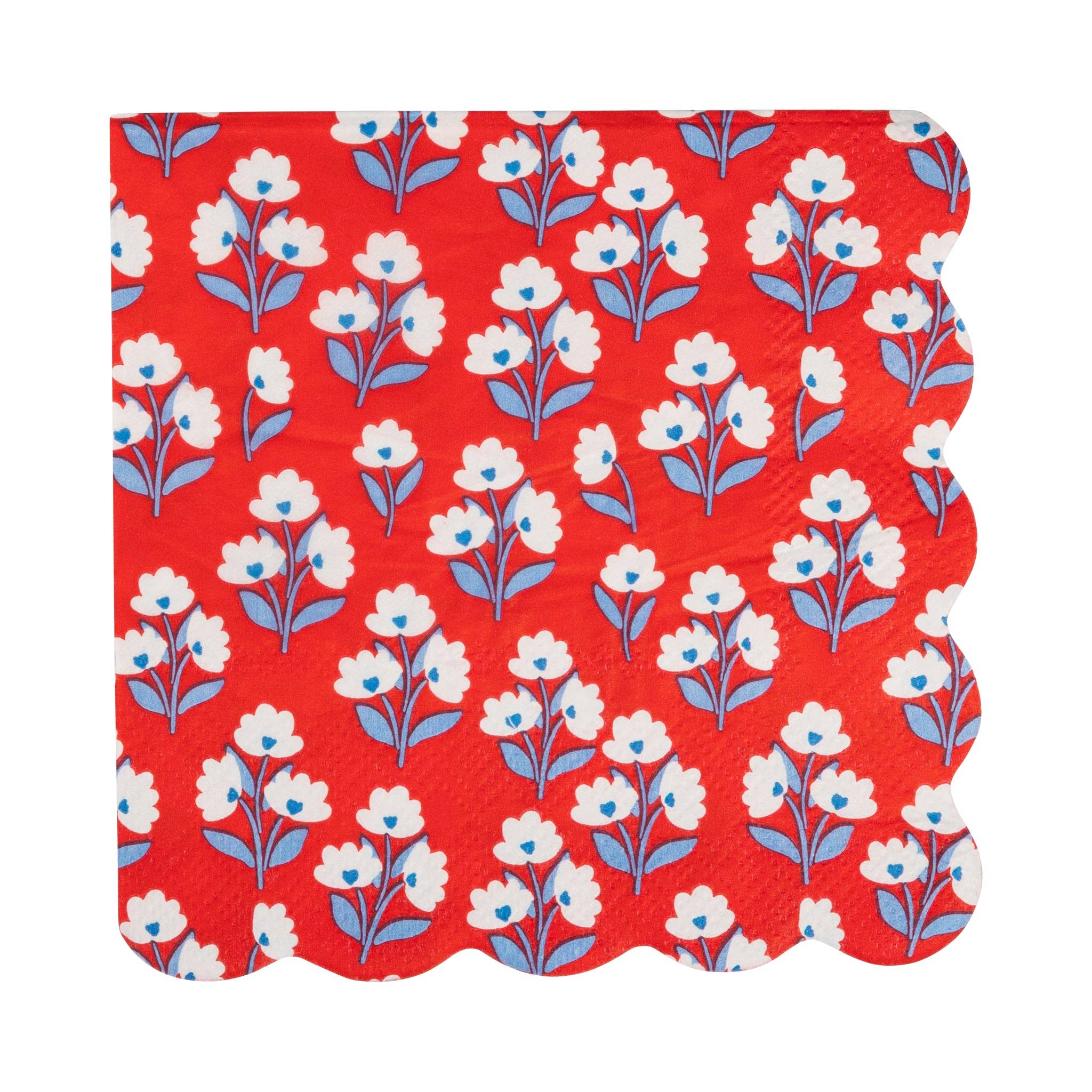 Floral patterned paper napkin with white flowers on a red background