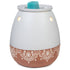 White and terracotta-colored wax warmer with a decorative pattern on a white background