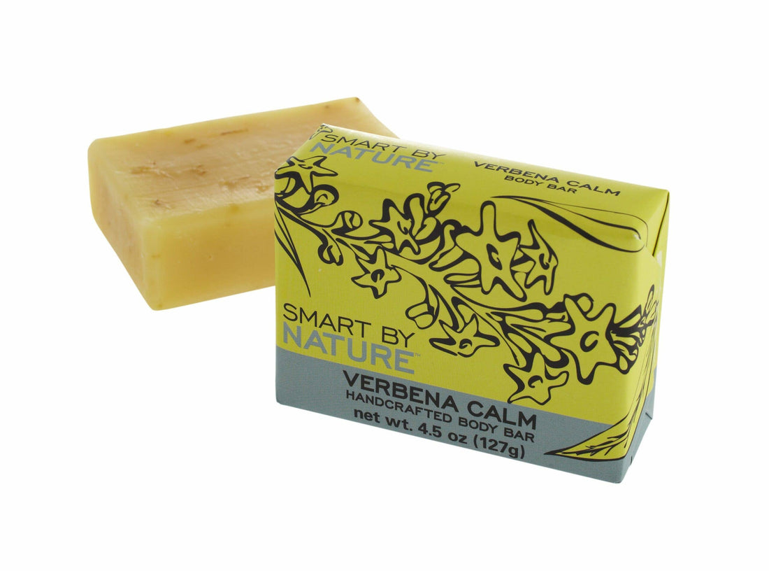 A handcrafted body bar of Verbenia Calm by Smart By Nature, shown with its yellow and gray packaging box on a white background.