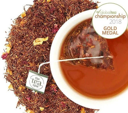 Tea leaves, tea bag, and brewed tea with &