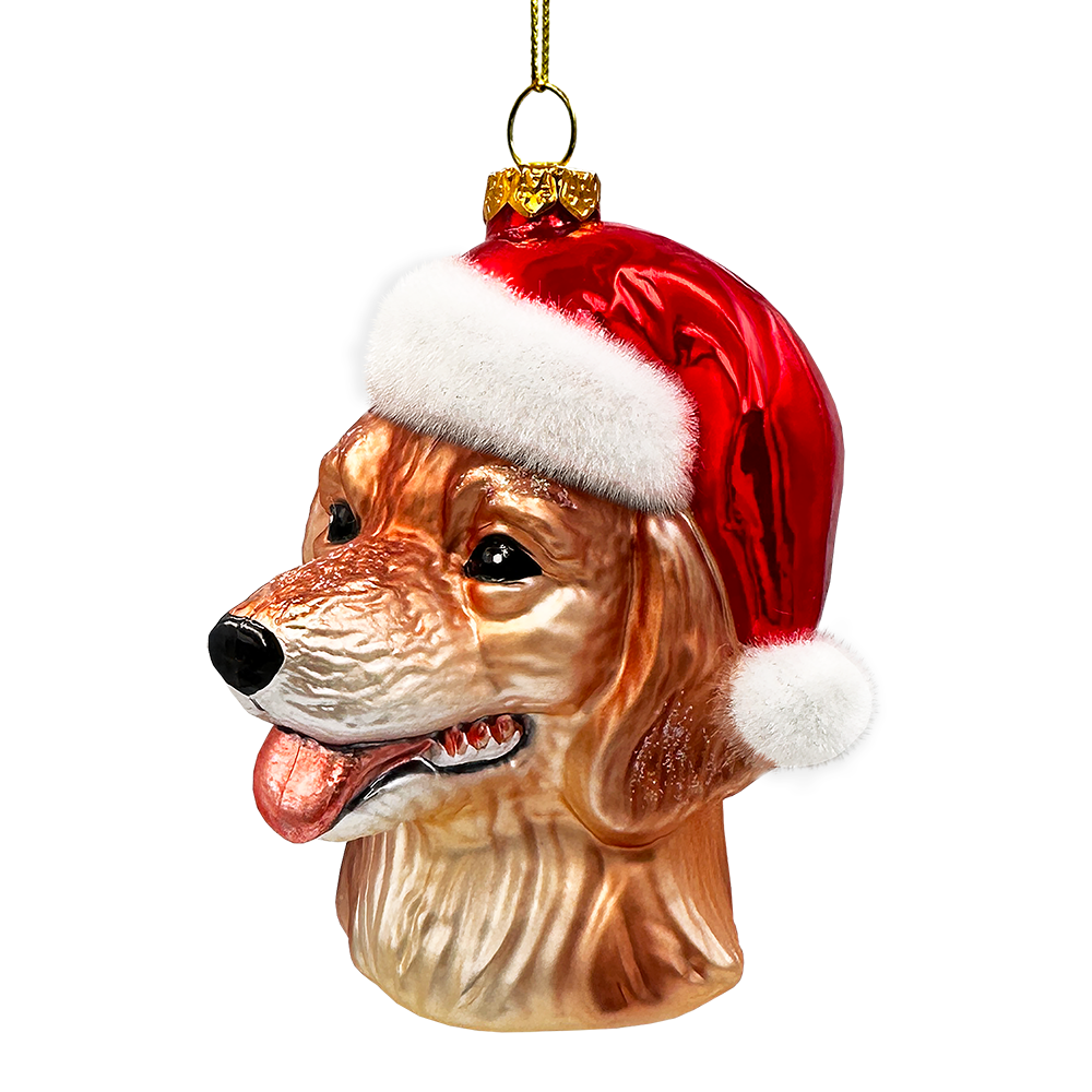 Dog-shaped Christmas ornament wearing a Santa hat on a white background