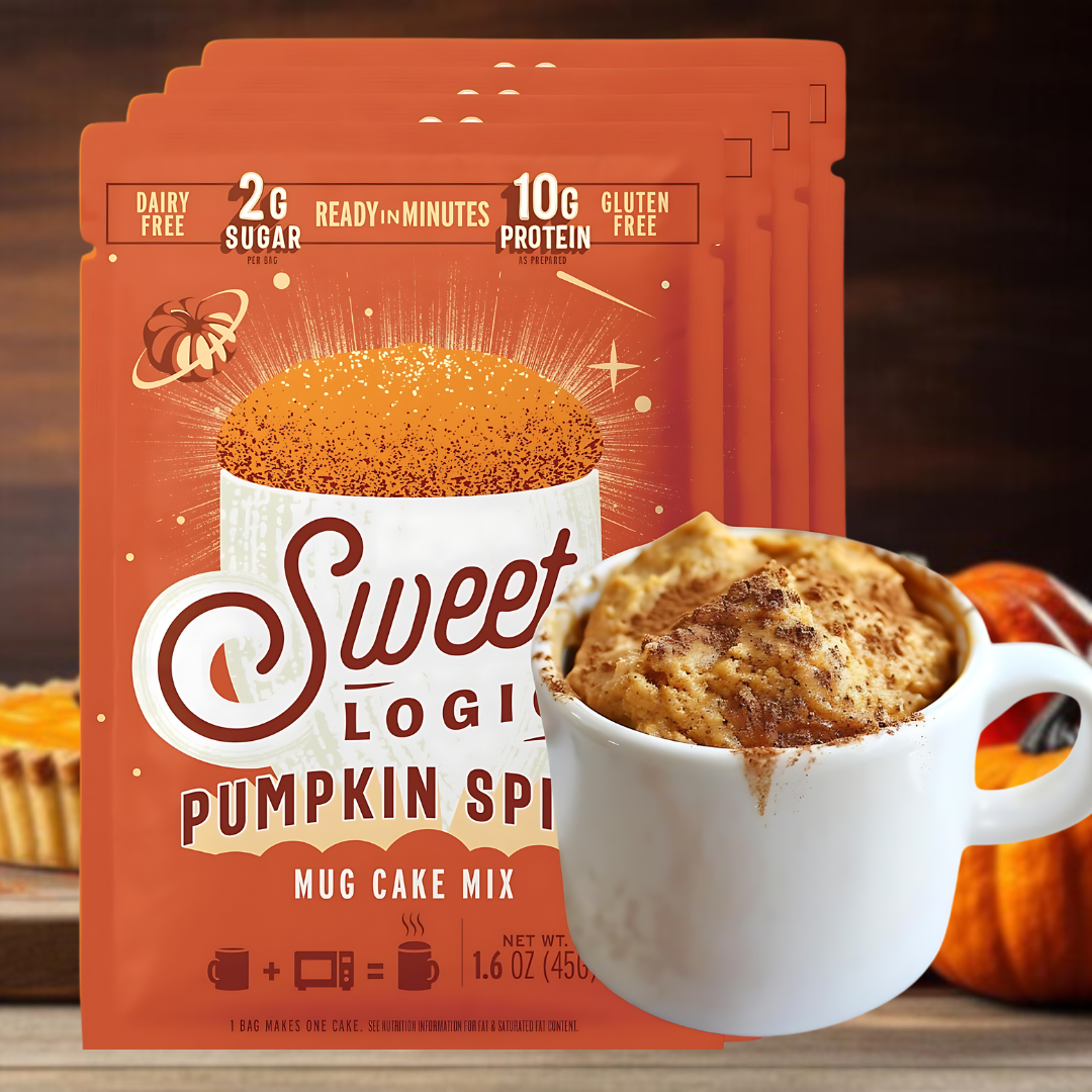 Sweet Logic Pumpkin Spice mug cake mix packaging with a cup of cake and pumpkins in the background.