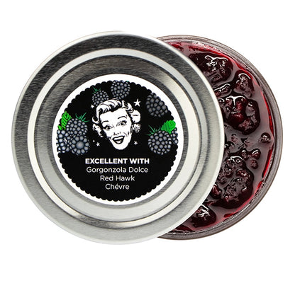 Jar of blackberry jam with a label featuring a vintage-style illustration and text.