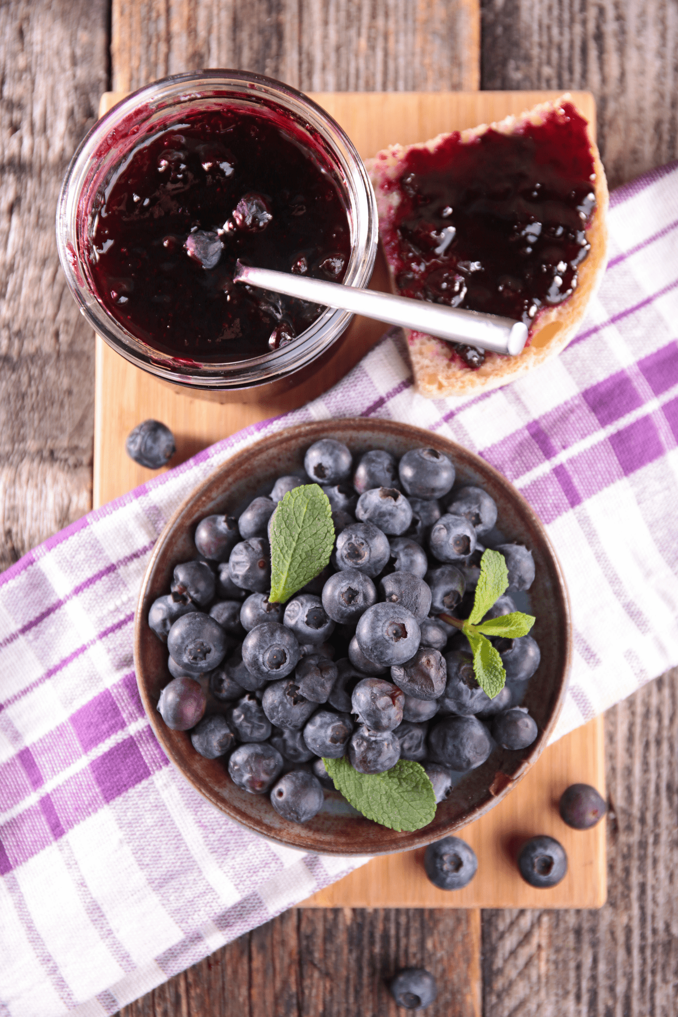 Naked Goat Farm Blueberry Marmalade Jam on Toast with Fresh Blueberries in Bowl