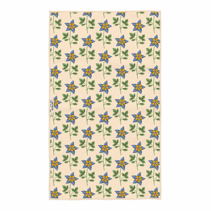 Beige fabric with blue and yellow floral pattern