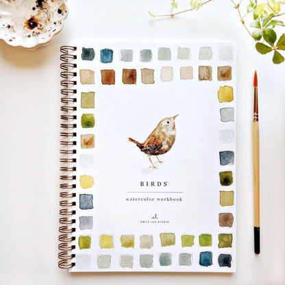A spiral-bound watercolor workbook titled &