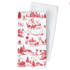 A white fabric tea towel with a red Christmas toile pattern, shown folded with a second plain white towel behind it on a white background.