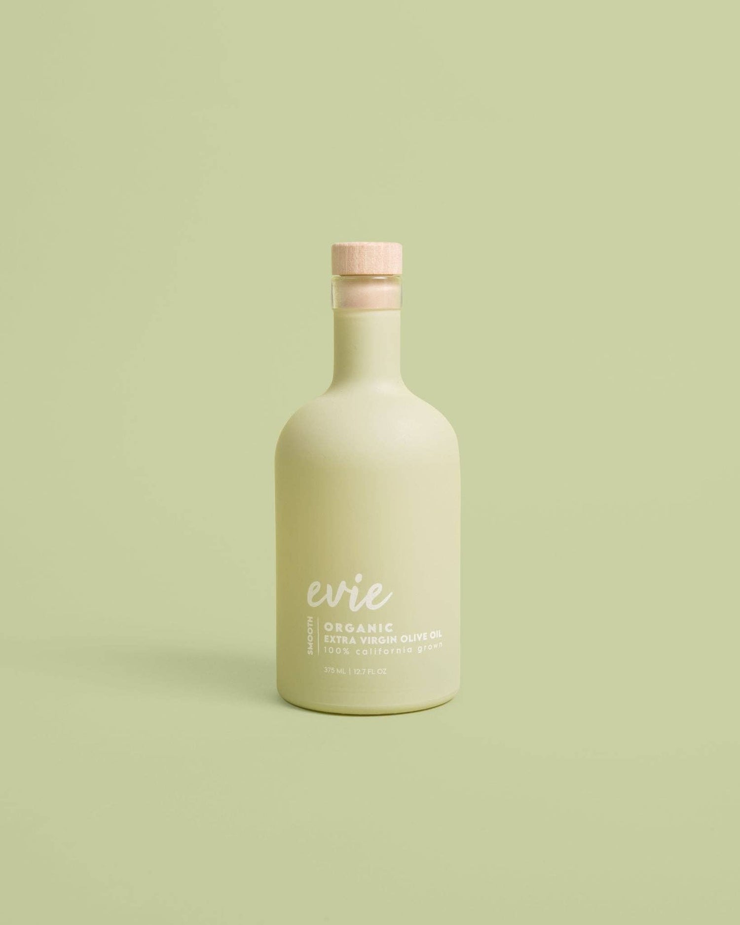 Beige bottle with &