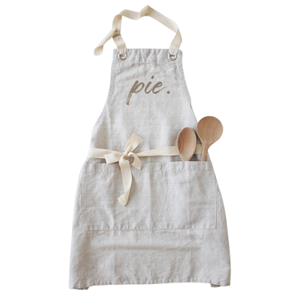 A light beige linen apron with &