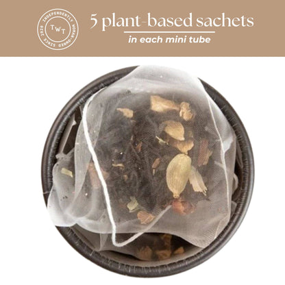 Tea bag with plant-based sachets in a mini tube, featuring TWT logo.