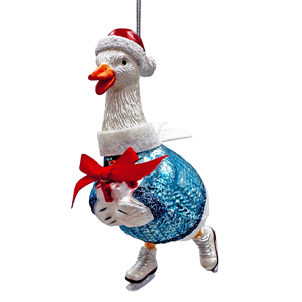 Decorative duck ornament wearing a Santa hat and blue dress with a red bow on a white background