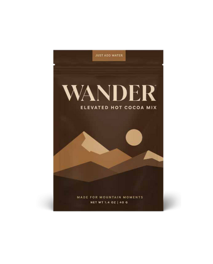 Wander elevated hot cocoa mix package with mountain design on a white background