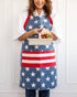 Person wearing an American flag apron holding a container of vegetables.
