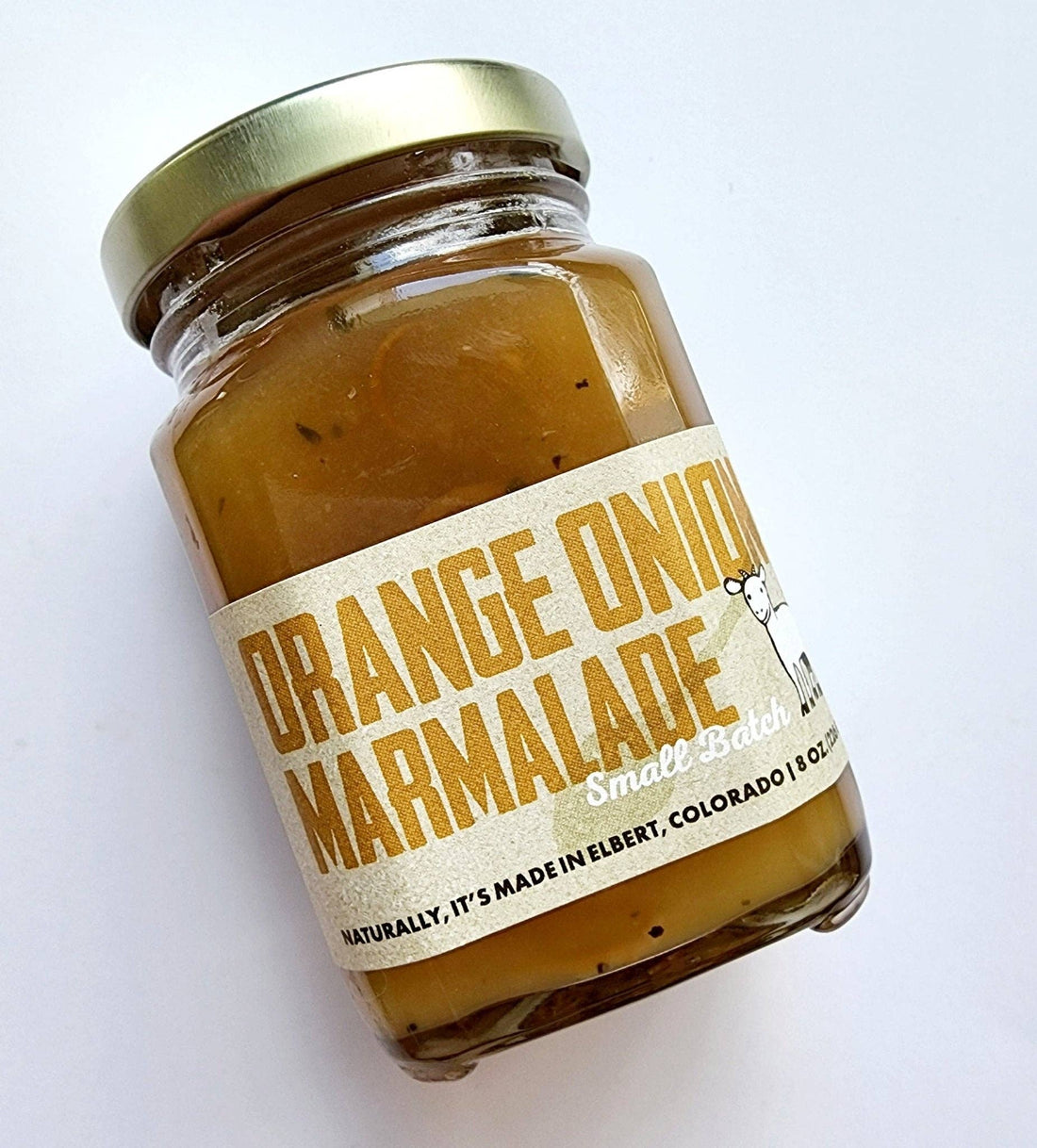 A small glass jar of Orange Onion Marmalade with a gold metal lid and a cream-colored label, photographed on a plain white background.