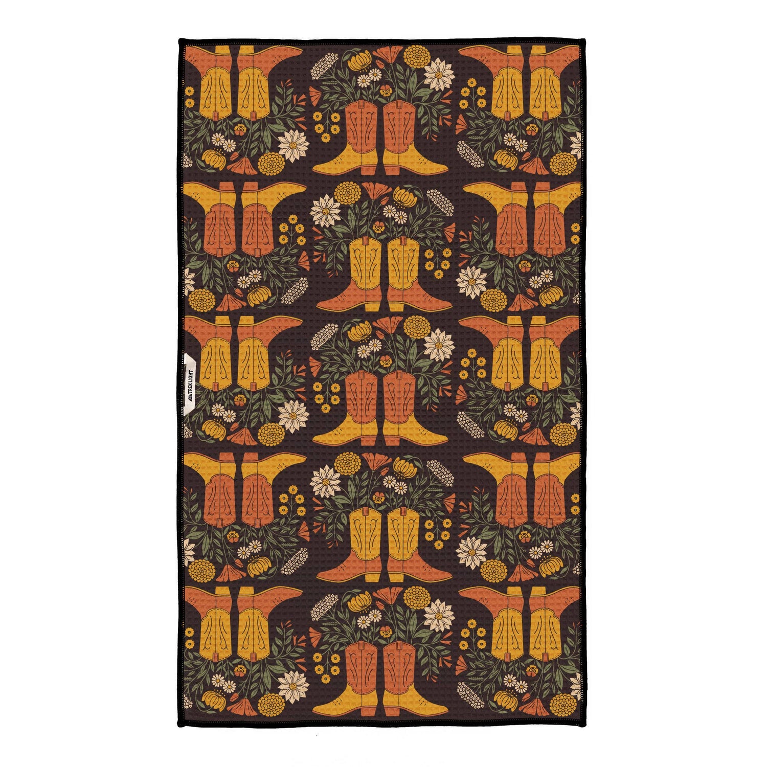 Decorative rug with cowboy boot and floral pattern on a dark background