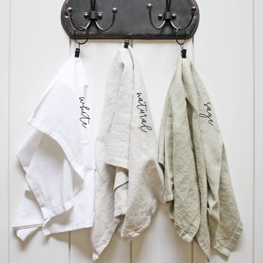 Three dishtowels labeled &