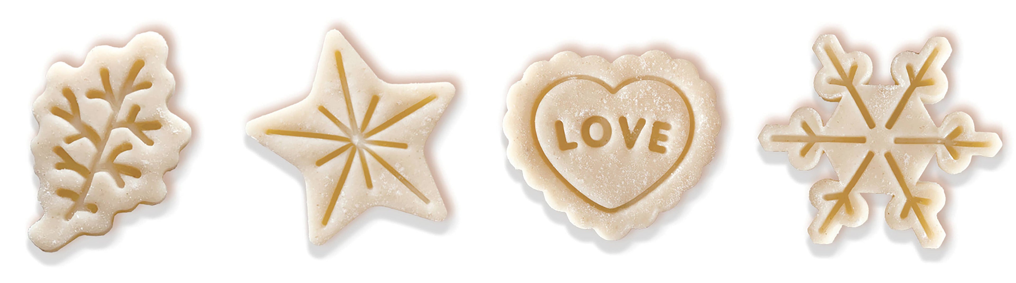Set of four cookie cutters shaped like a leaf, star, heart with &
