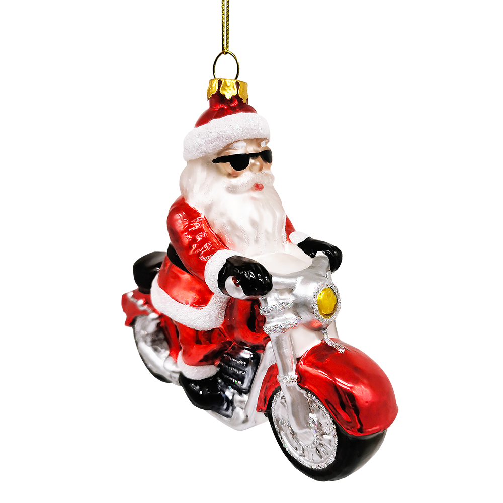 Santa Claus riding a motorcycle ornament on a white background
