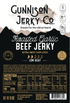 Gunnison Jerky Co. Roasted Garlic Beef Jerky packaging with nutritional information and branding details.