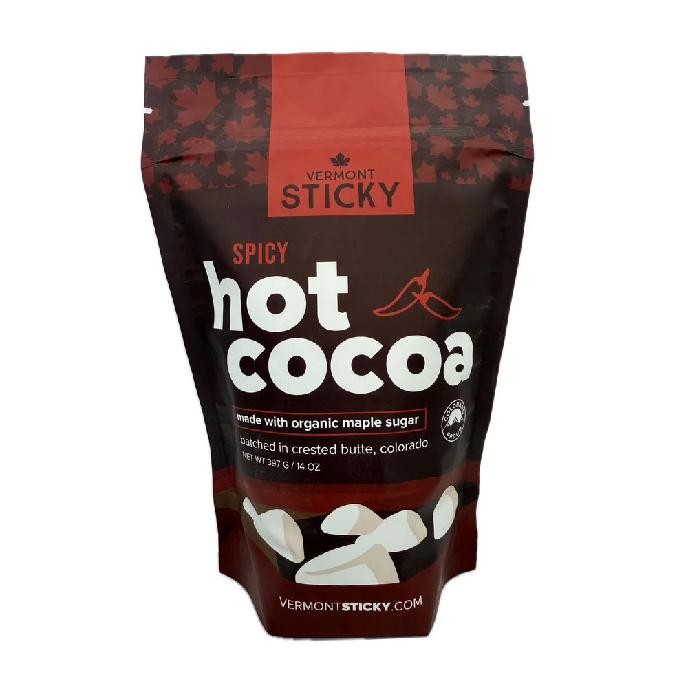 Bag of Vermont Sticky Spicy Hot Cocoa with maple leaf design on a white background